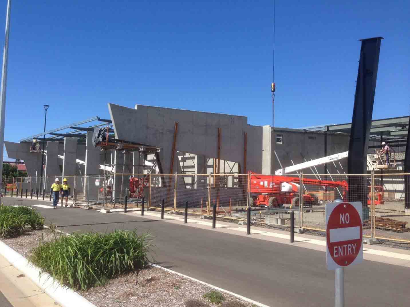Concrete Walls, Metal Beams, Crane, Orange Lift — Wieland Concreting in Rockhampton, QLD