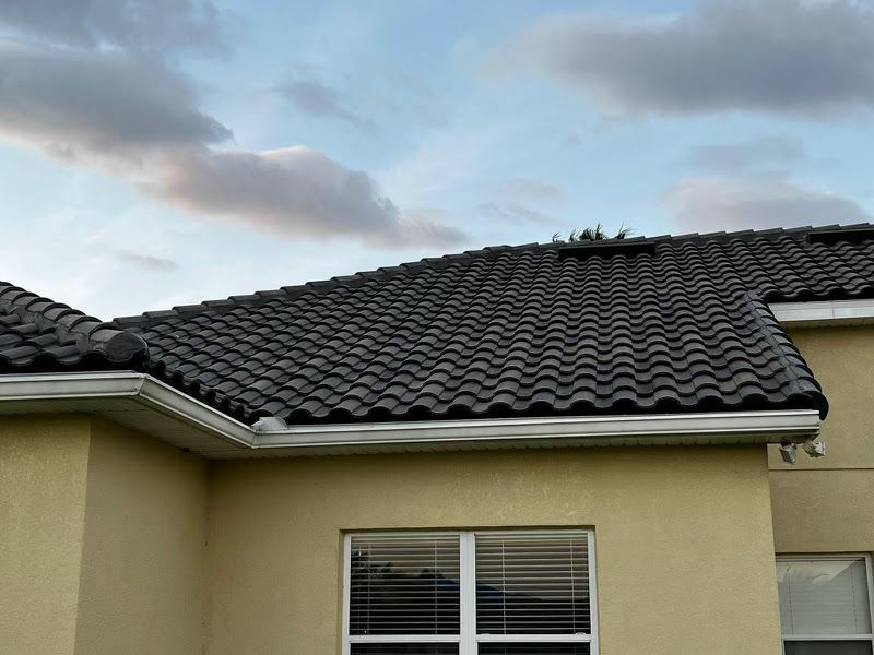 A house with a tiled roof and a window
