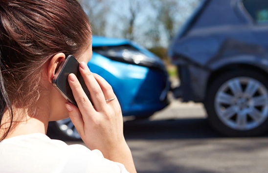 Woman Holding A Phone | Naples, Florida | Auto Accident Attorney of Naples, FL