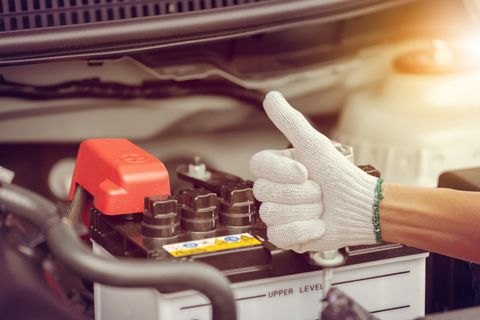 Professional technician successfully change a car battery — Canton, OH — Northern Mobile Electric