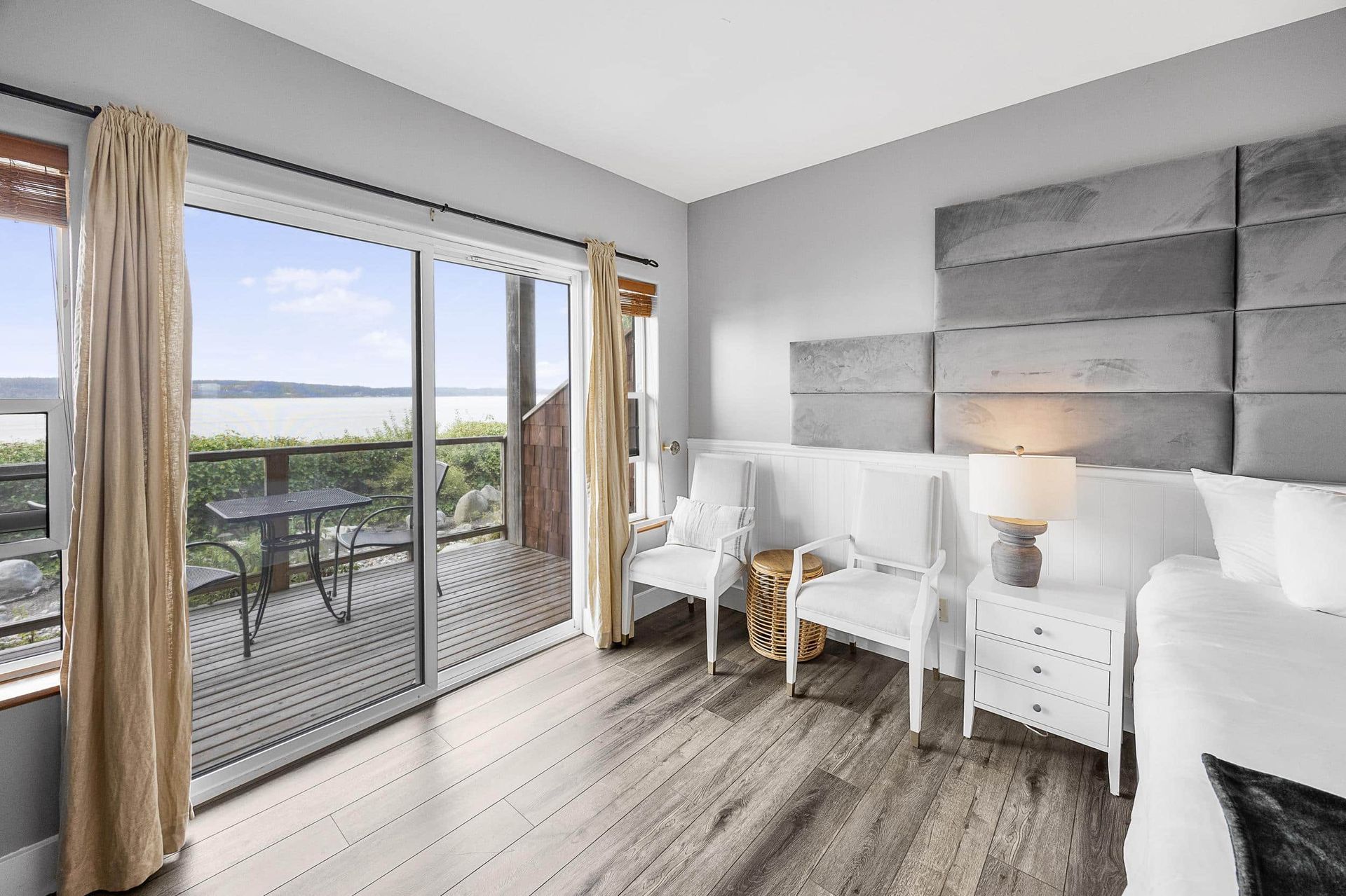 A hotel room with a jacuzzi tub and a bed