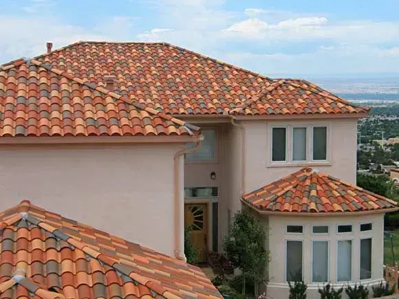 A large white house with a tiled roof