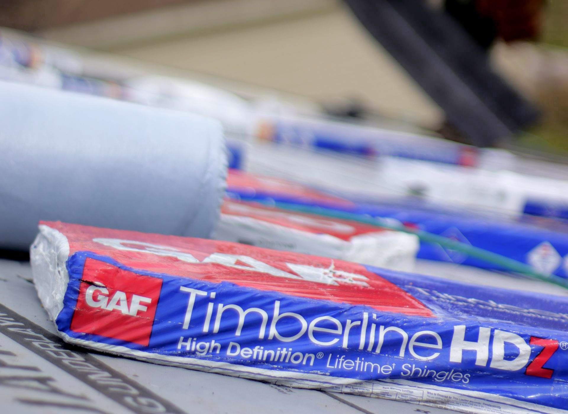 A bag of timberline hdz sitting on top of a roof