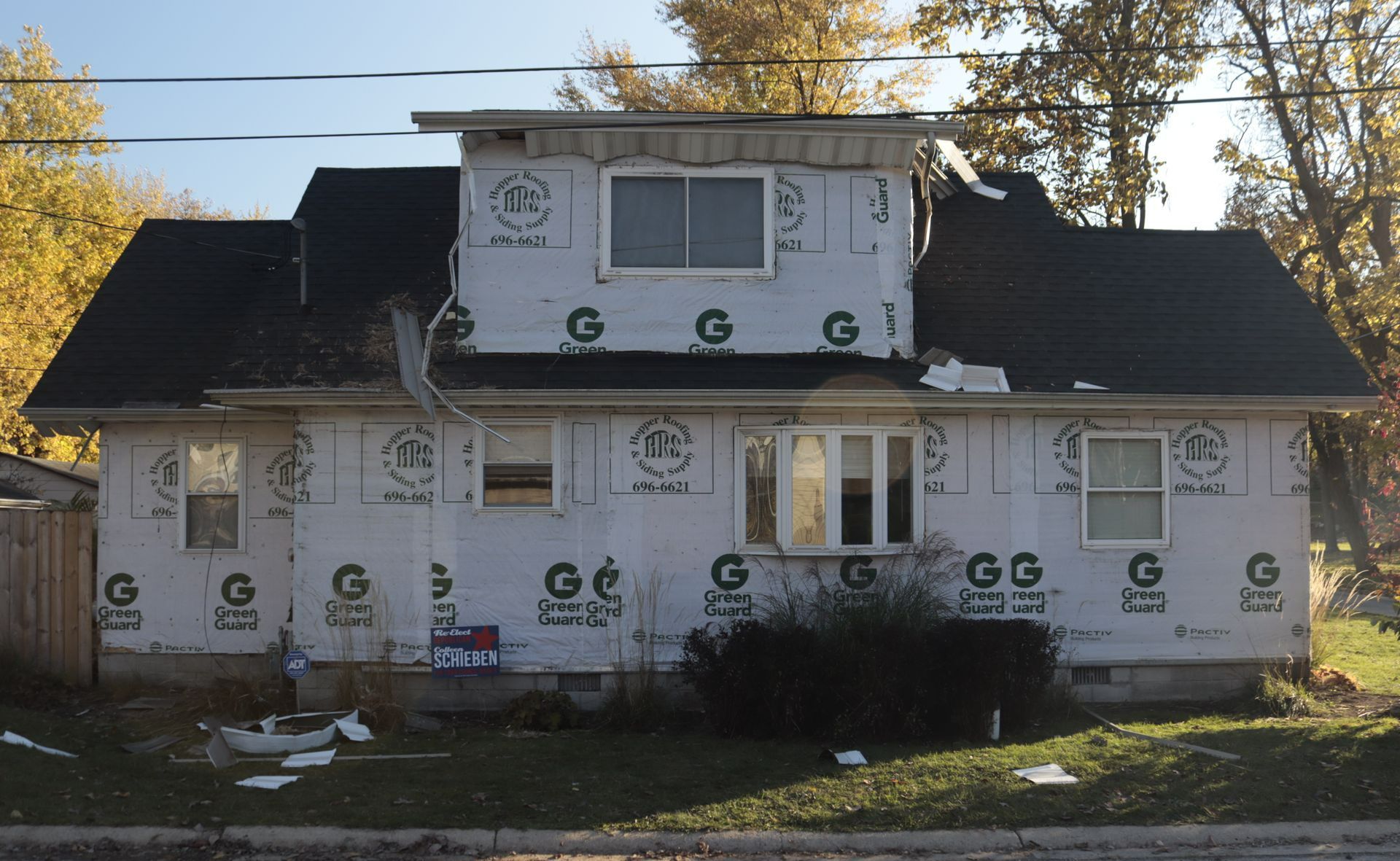 A house with a roof that is being built.