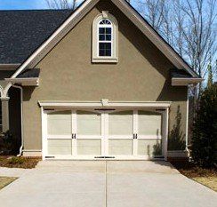Garage Door Services — Brown Colored House With Garage in Virginia Beach, VA