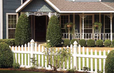 Residential Fence In Landscaping With Shrubs — Riverside, CA — Elrod Fence Co