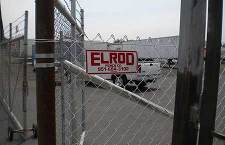 Commercial Wire Fence With Company Logo — Riverside, CA — Elrod Fence Co