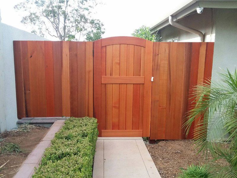 Beautiful Wood Fence With Door — Riverside, CA — Elrod Fence Co