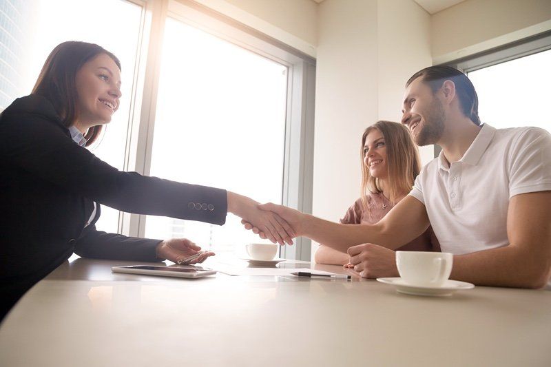 shaking a property managers hand