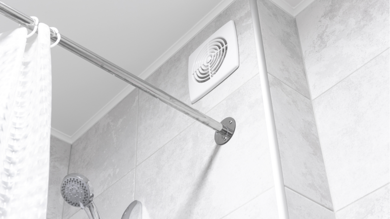 A shower curtain rod mounted on a tiled bathroom wall with an exhaust fan vent above.