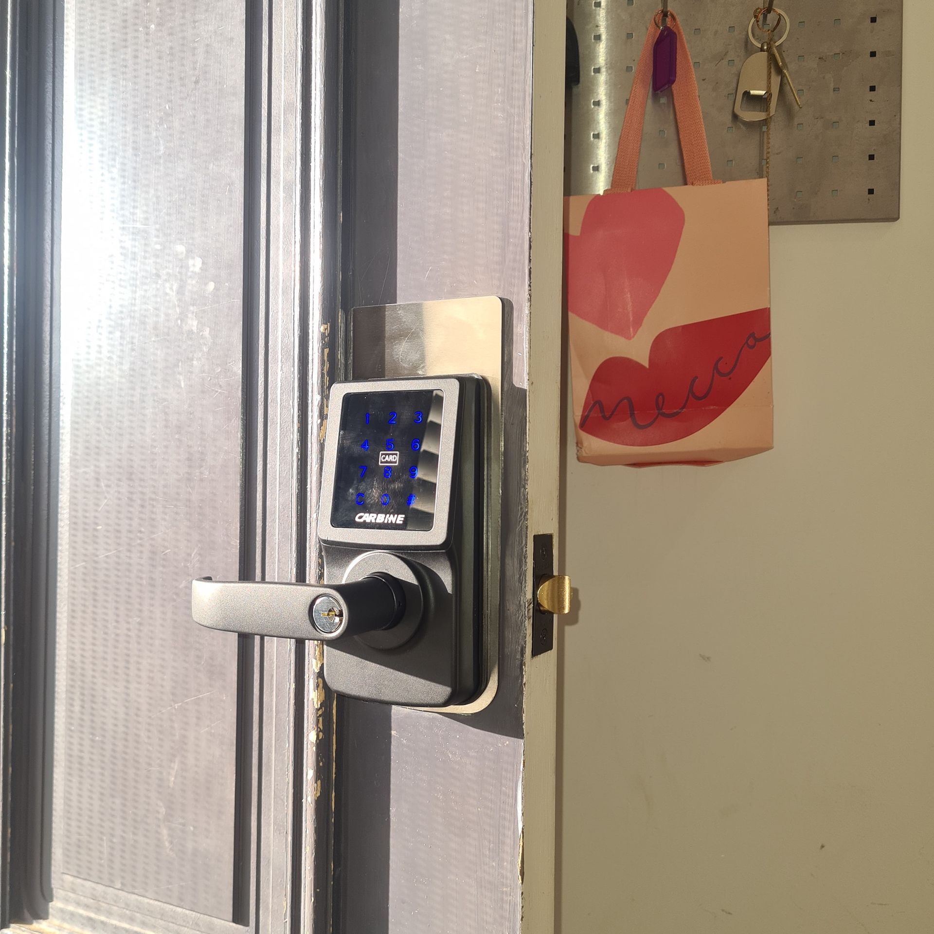 A Door With A Digital Lock On It — Barwon Locksmith & Security Doors in Grovedale, VIC