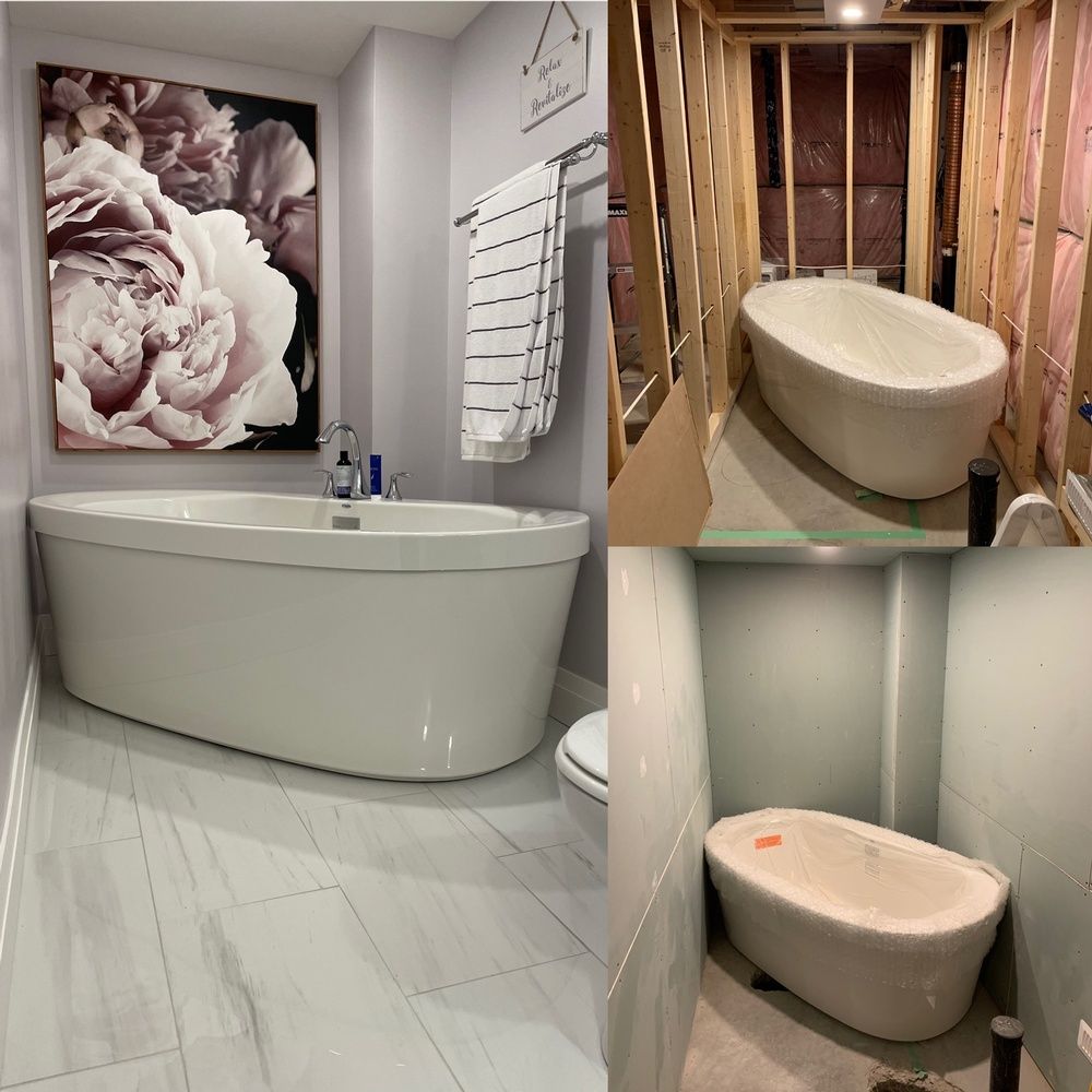 A bathroom with a bathtub and a toilet under construction.