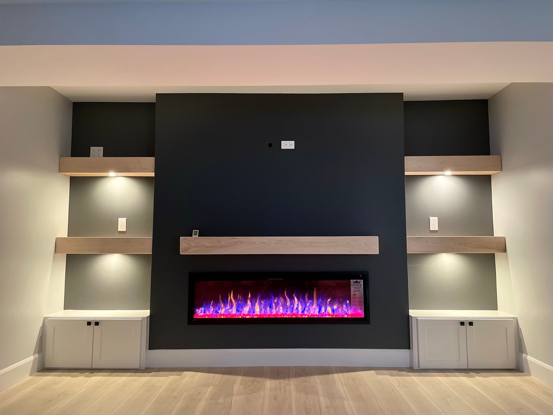 There is a fireplace in the middle of the room.