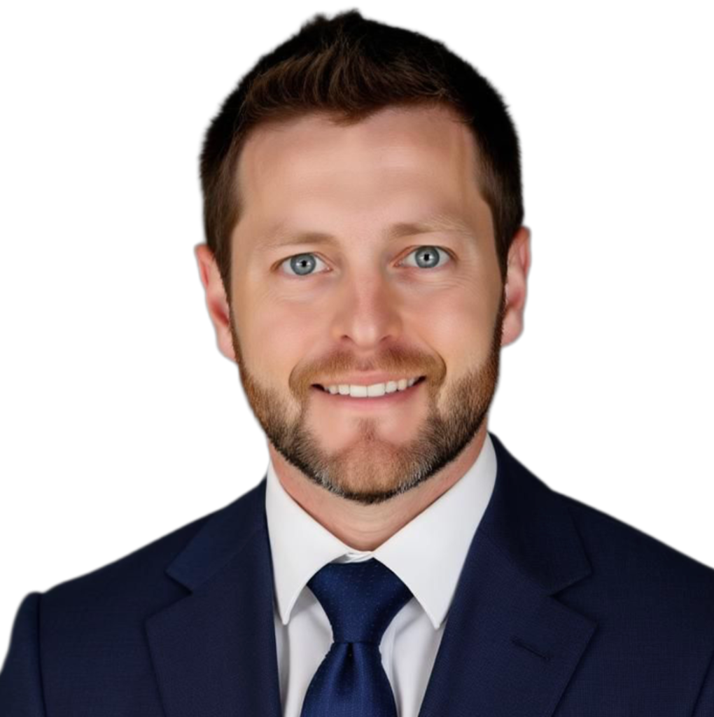 Headshot of a smiling person in a navy suit and tie on a white background