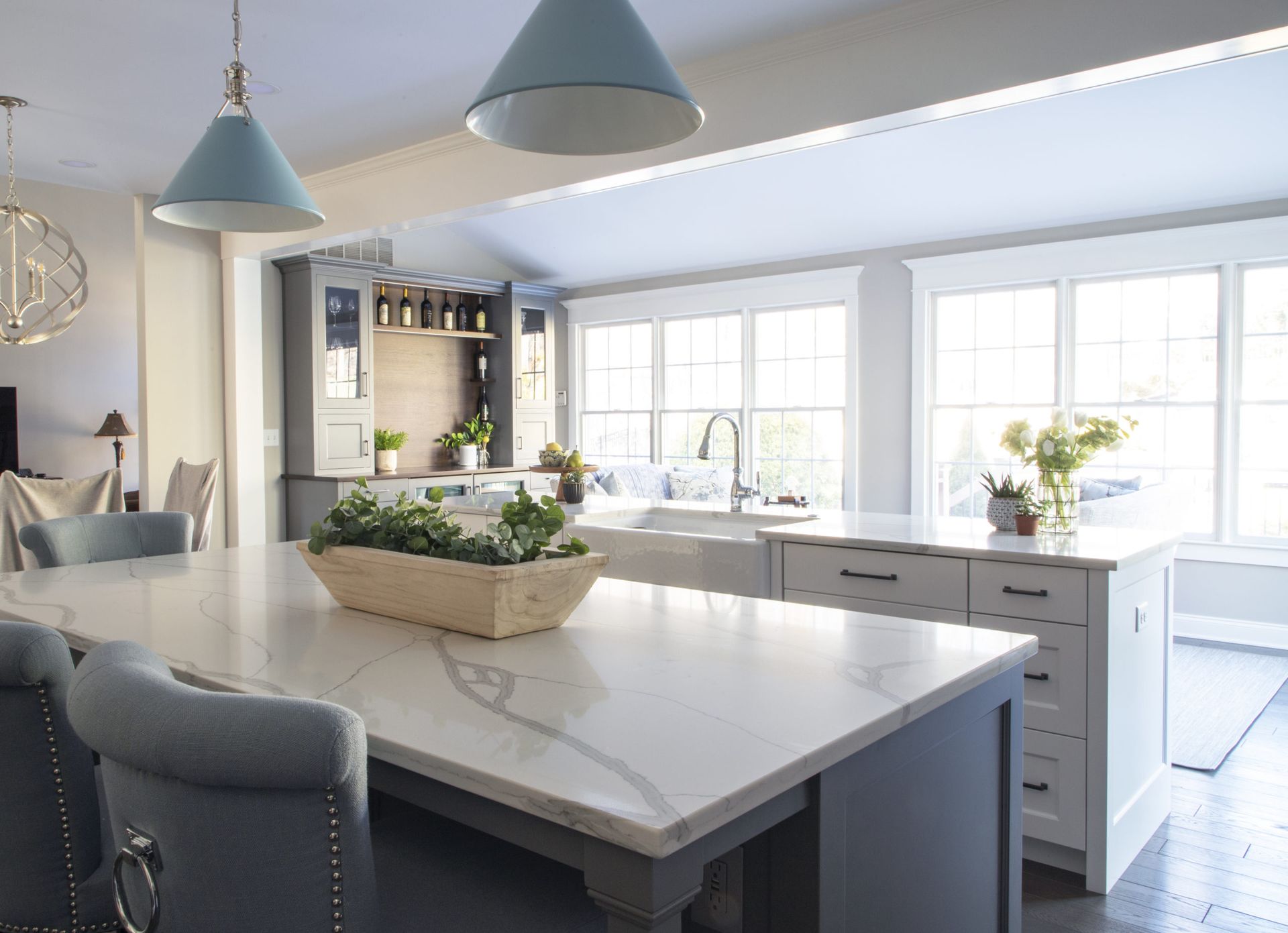 There is a large island in the middle of the kitchen.