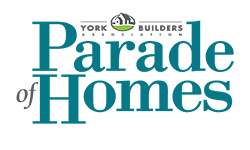 The logo for the parade of homes is blue and white