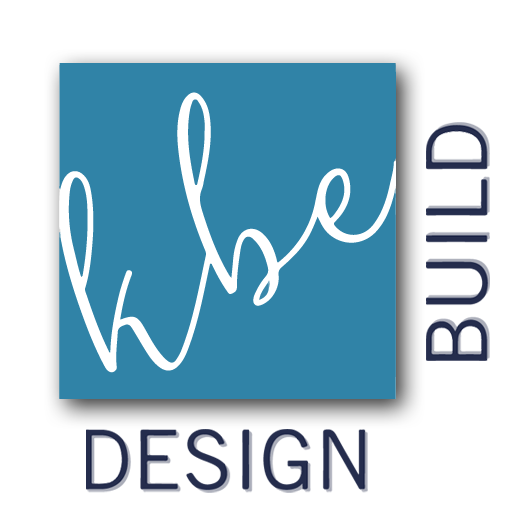 A logo for wise design build with a blue background