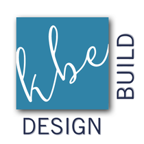 A logo for wise design build with a blue background