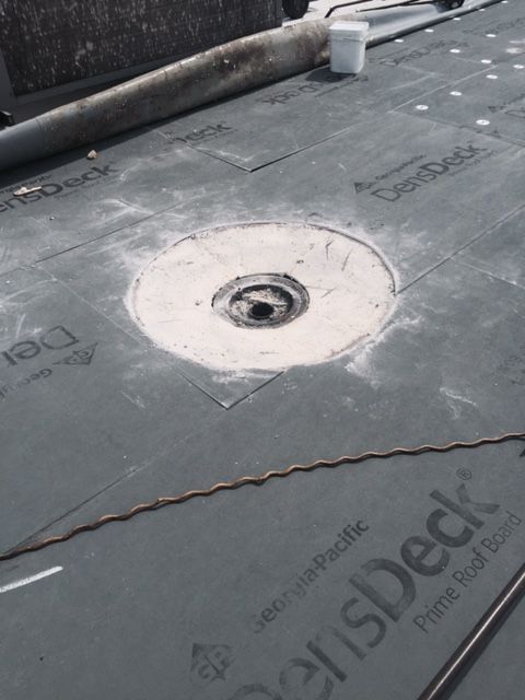 A roof with a hole in it and the word deck on it
