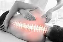 Person receiving chiropractic treatment with highlighted spine.