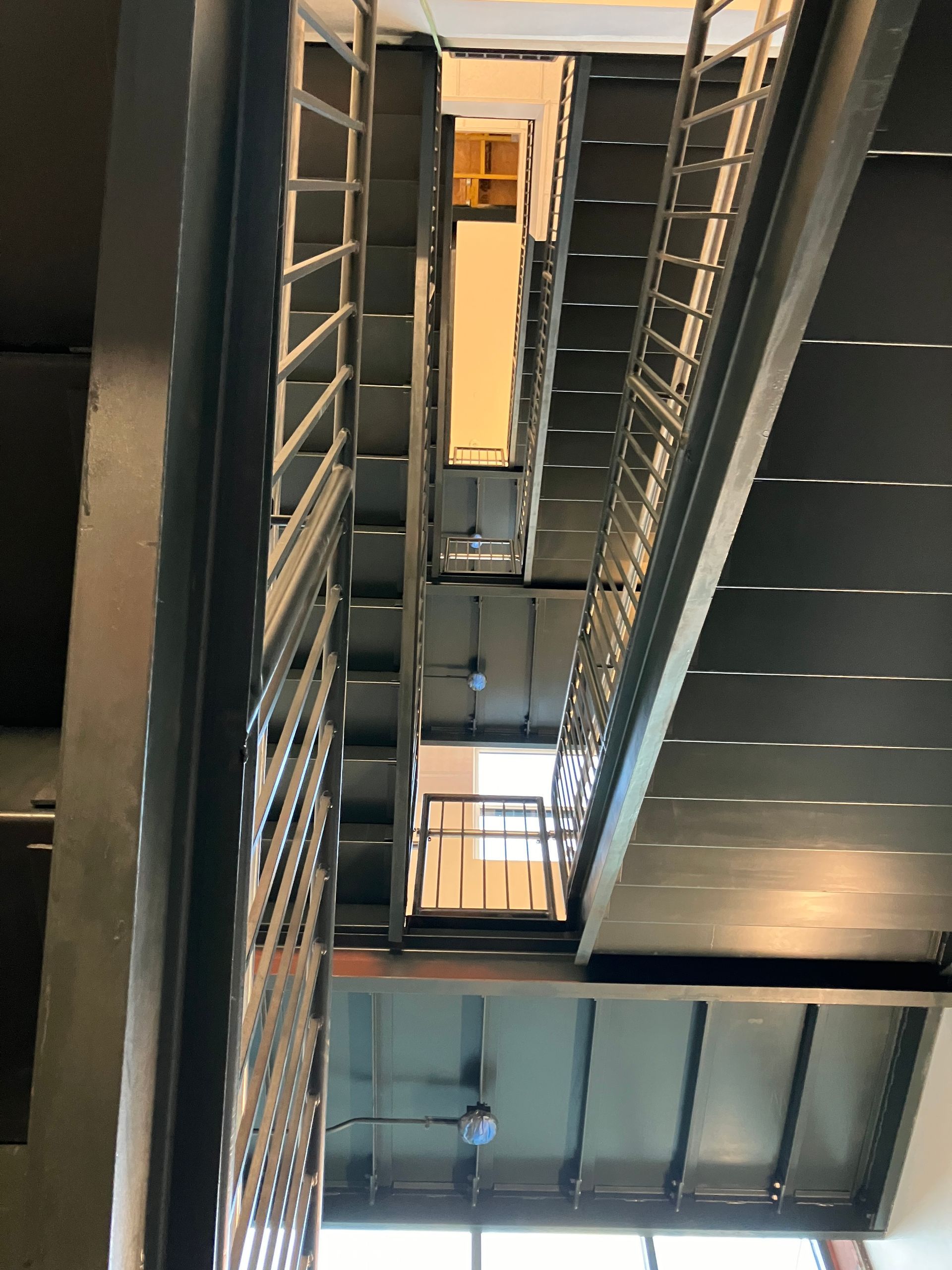 Looking down a set of stairs in a building