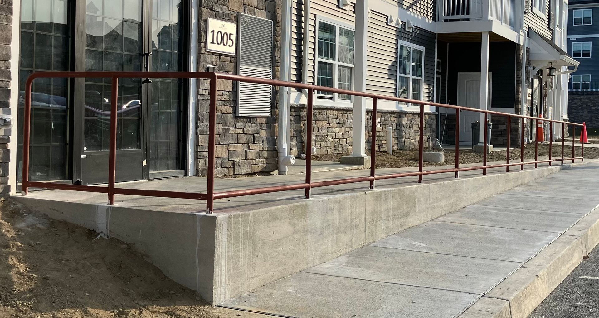 A ramp is being built in front of a building.