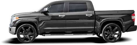 Black Toyota Tundra pickup truck with black wheels and tinted windows.