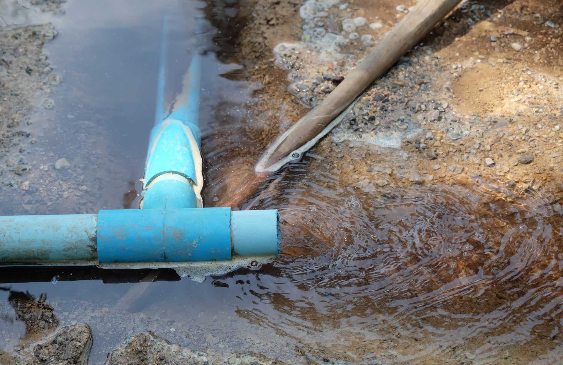Broken Blue plastic drain pipe.