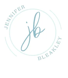 Light blue circular monogram logo with “Jennifer” and “Bleakley” around stylized “jb” initials