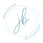 Light blue circular logo with cursive “jb” and the name Jennifer Bleakley around it