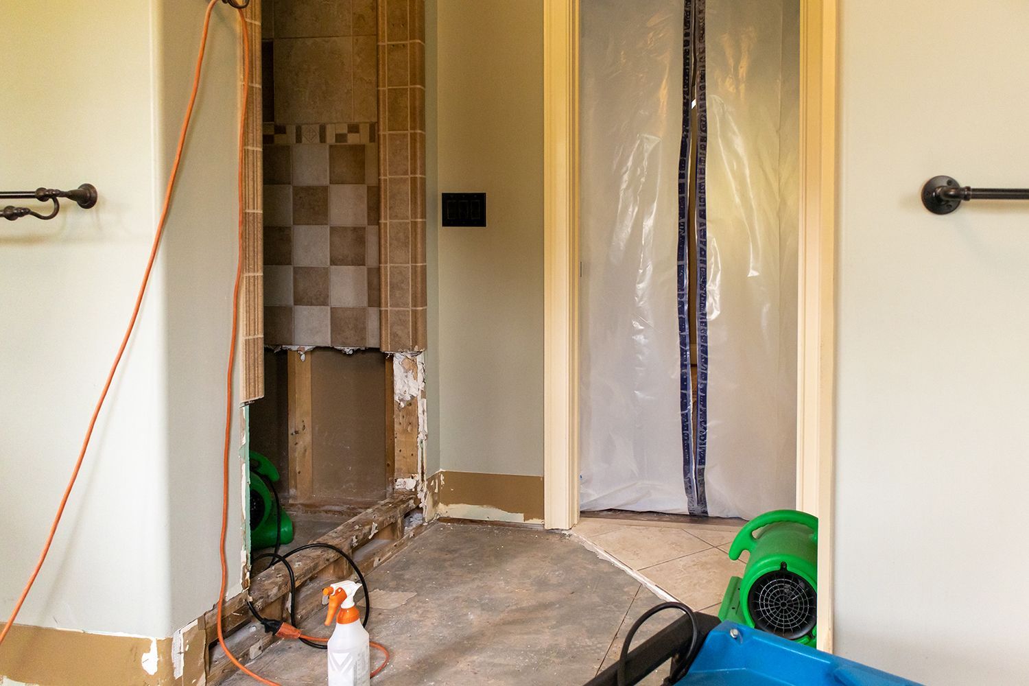 Mold removal and water damage restoration in a bathroom.