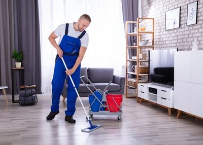 Biohazard Clean Up — Professional Cleaning Floor With Mop in Flagstaff, AZ