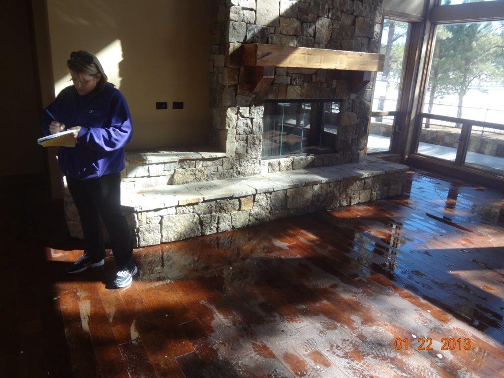 Flood Damage Restoration — Employee On-Site in Flagstaff, AZ
