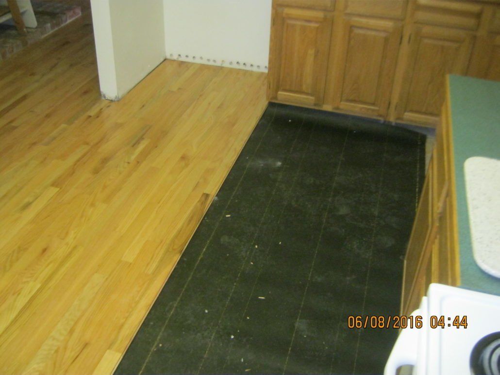 Installing Rubber Insolation Under Wooden Floor — Flagstaff, AZ — Superior Restoration Services