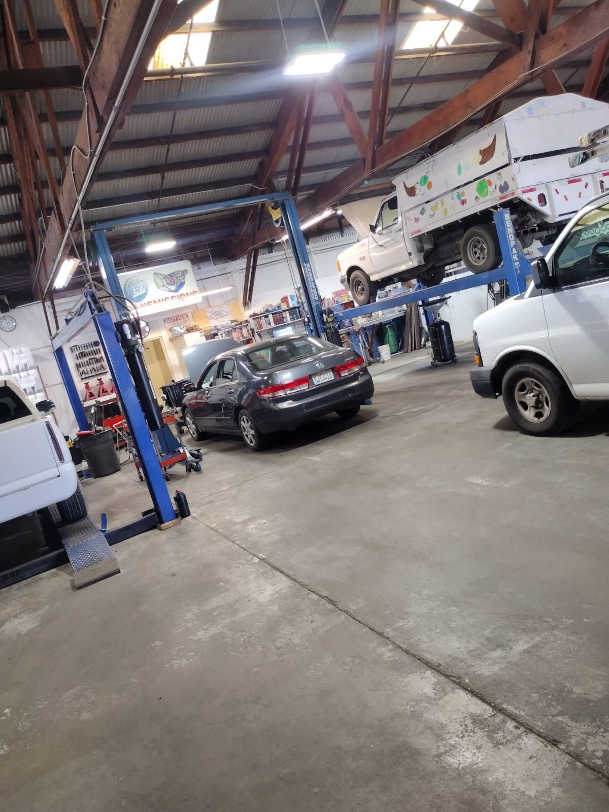 A person is working on an air conditioning system in a car.