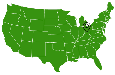 A green map of the united states with a pin pointing to ohio