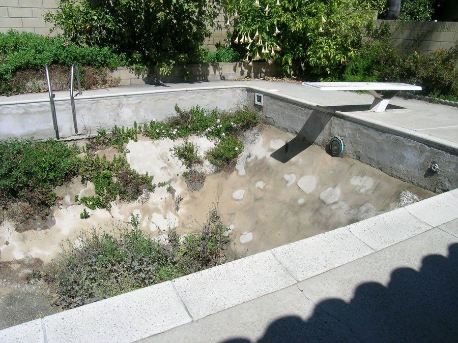 Swimming Pool With No Water — Mira Loma, CA — Sneve Bobcat Service