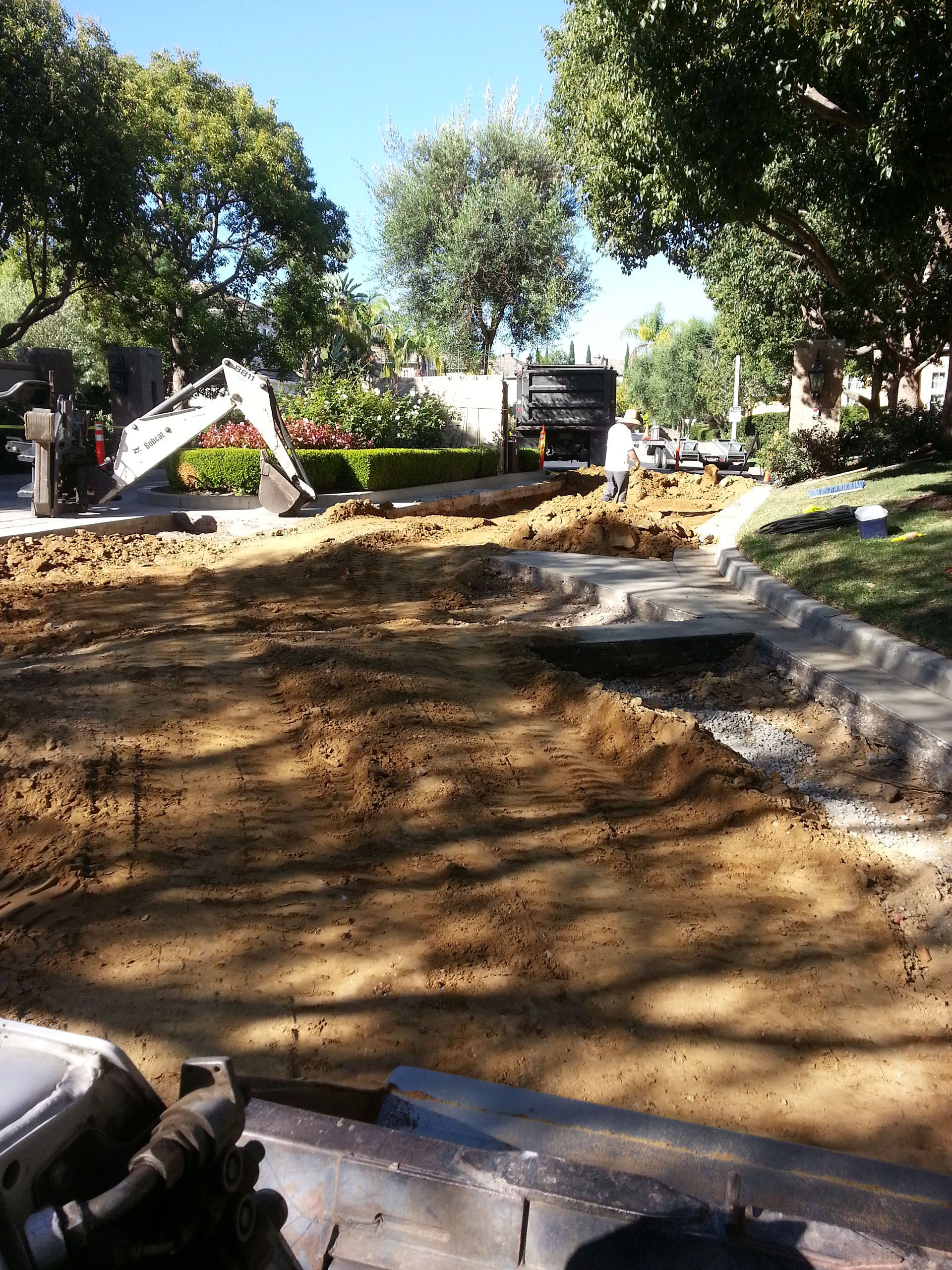 Breaking Out Asphalt — Mira Loma, CA — Sneve Bobcat Service