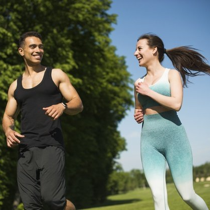 Cropped shot of a handsome young man listening to music on his tablet while relaxing on a sofa at home