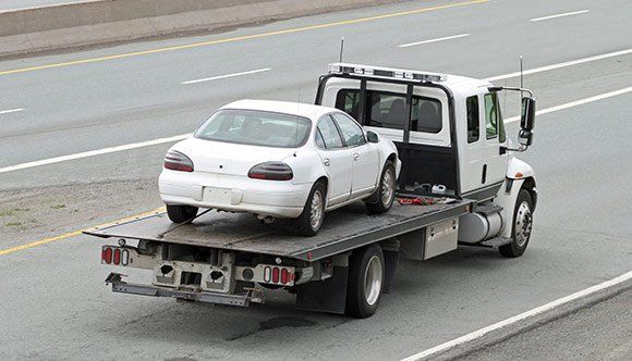 Towing Car On A Road — Morristown, NJ — Gerry's Heavy Duty Towing