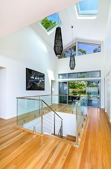 Staircase With Hanging Lights — Painting Services in Central Coast, NSW