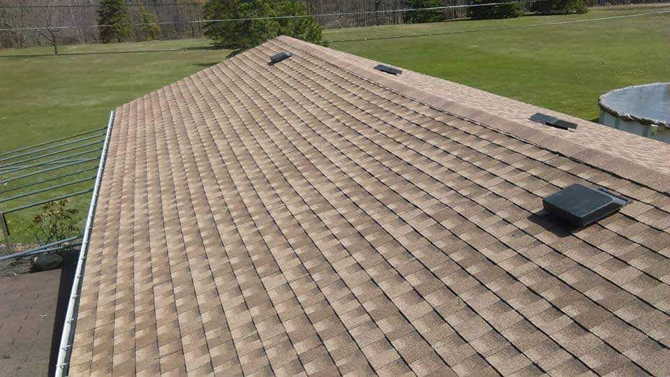 The roof of a house with a lot of shingles on it