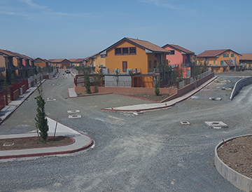 An aerial view of a residential area with a lot of houses