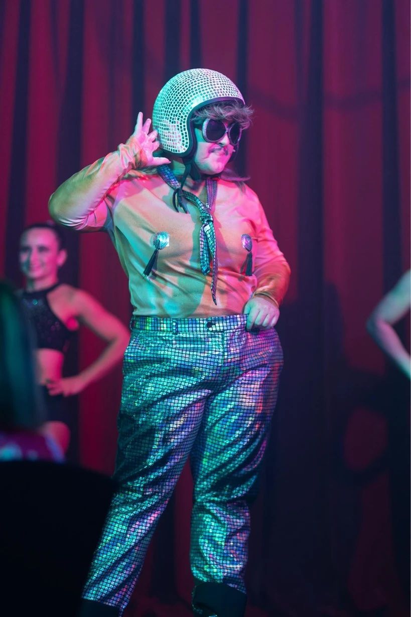 Three Women In Pink Feathered Costumes Are Standing Next To Each Other  — Lux Noir In  Townsville City, QLD