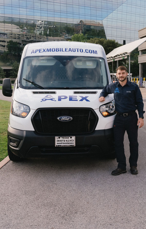 Man in uniform leans on white van with 