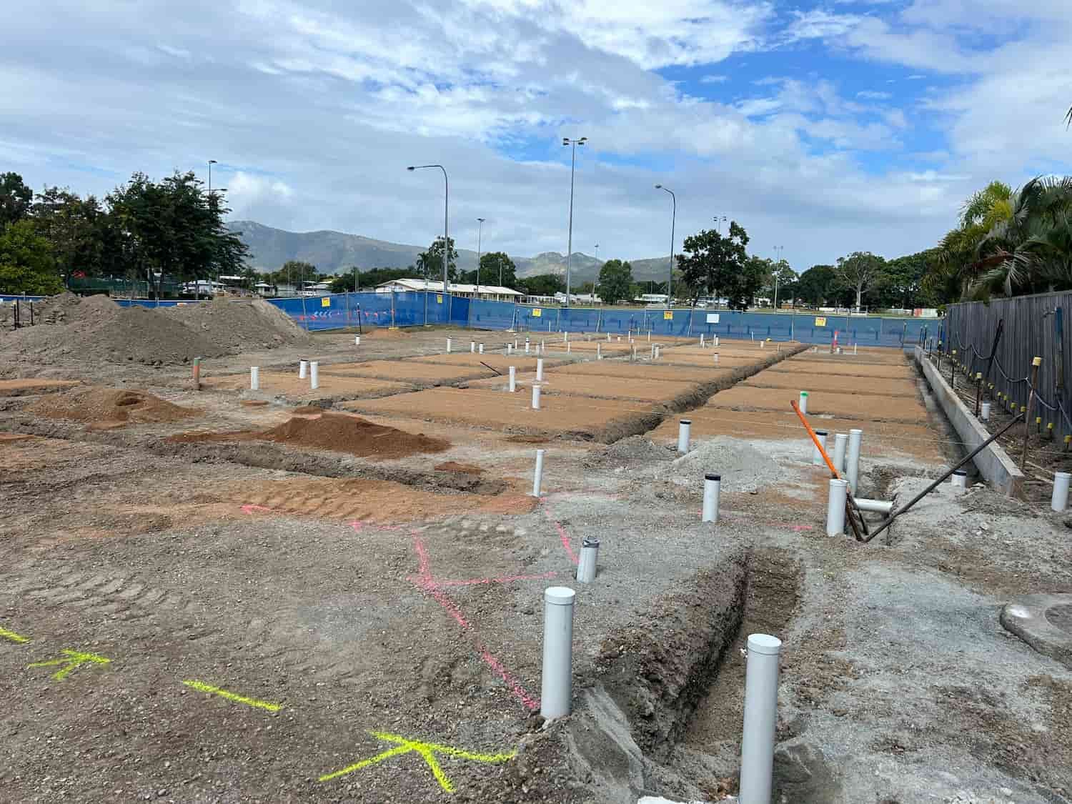 A Construction Site With a Lot of Pipes in the Dirt Guppy's Daycare Centre