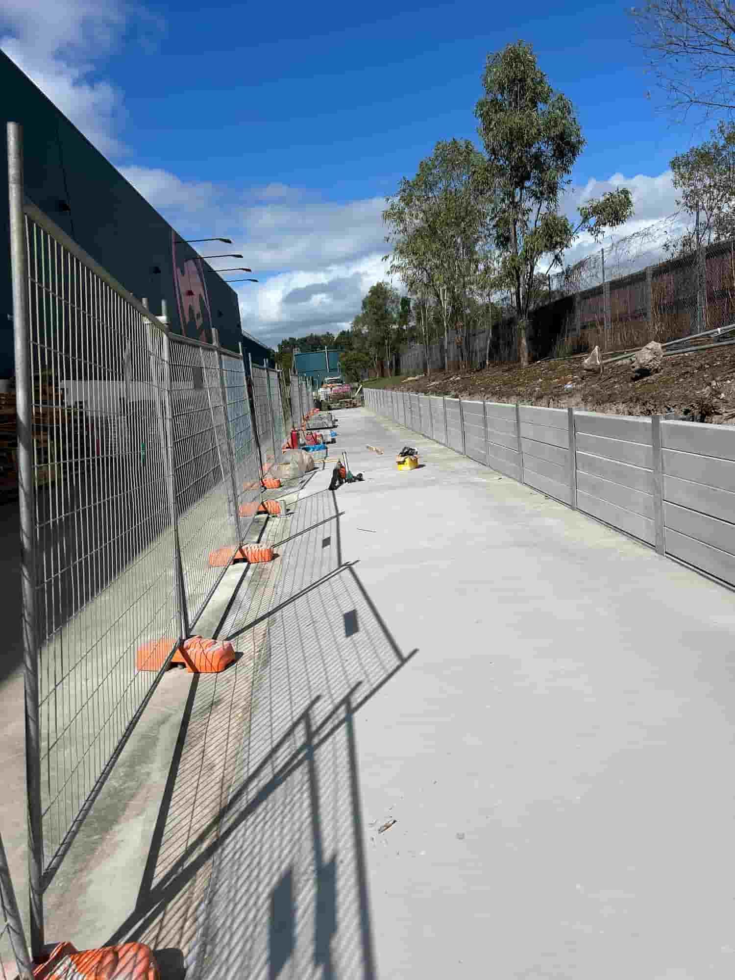 There is a Fence Along the Side of the Road — Diamond Concreting In Mount Low, QLD
