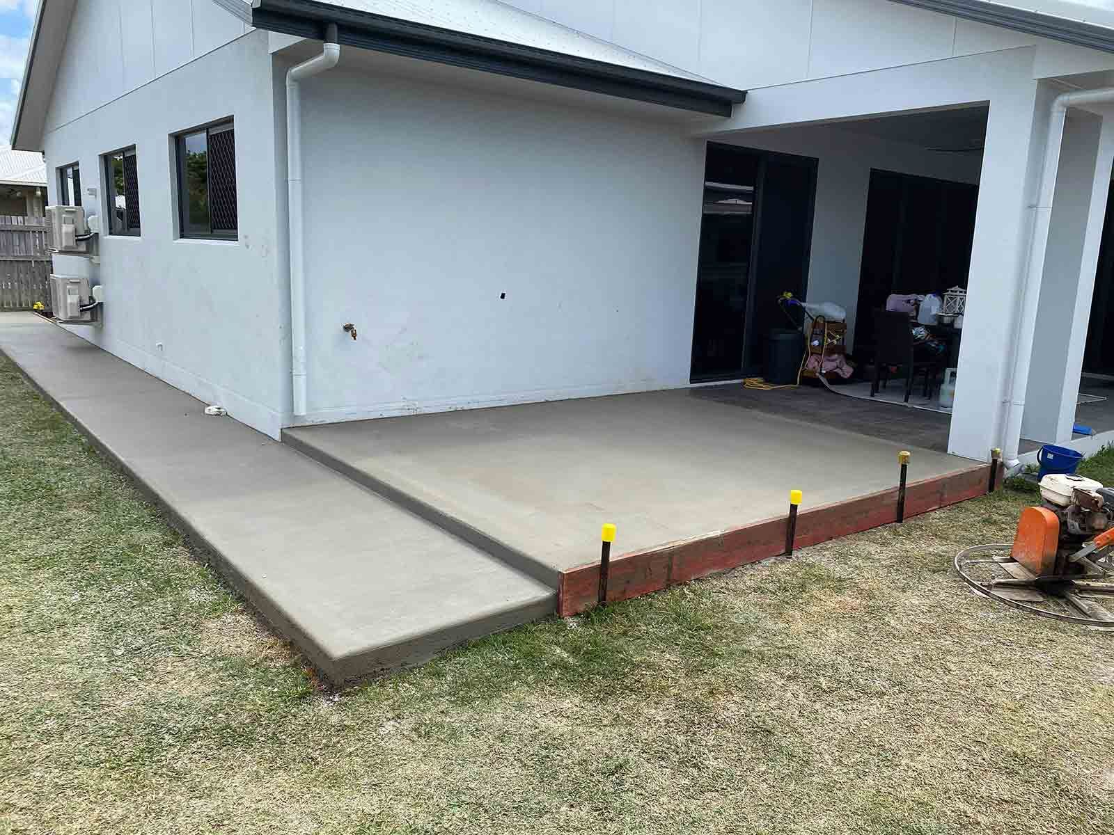 White House With A Concrete Walkway In Front Of It — Diamond Concreting In Mount Low, QLD