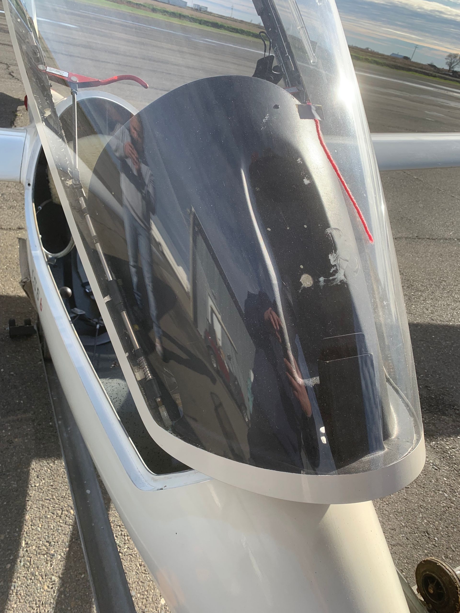 A close up of a plane with a clear windshield