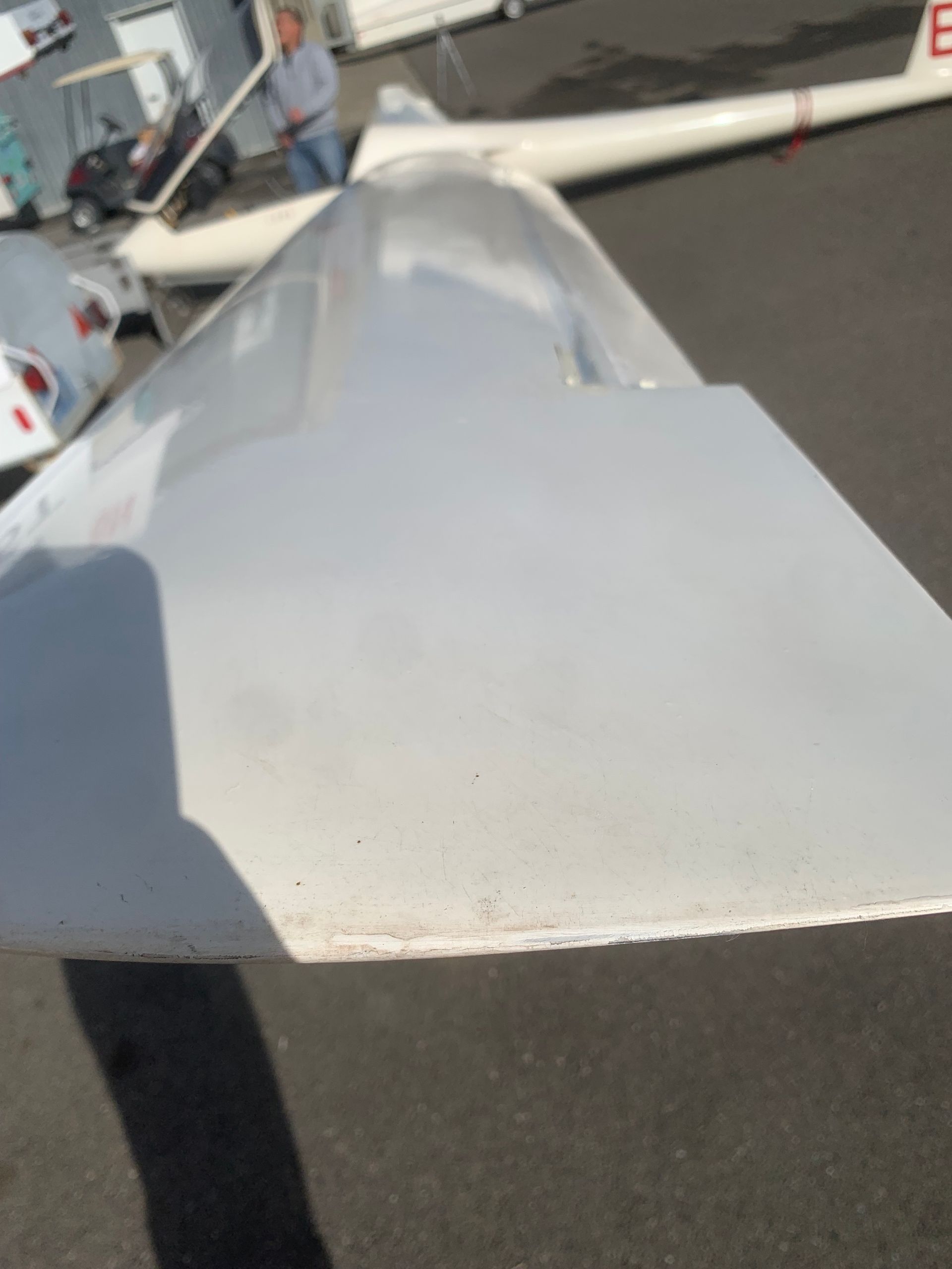 A white plane wing with the letter e on it